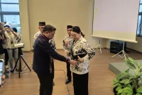 Dikukuhkan sebagai Bunda Guru PGRI Kota Ambon, Lisa Wattimena Ajak Guru Jaga Integritas dan Wujudkan Generasi Emas